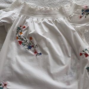 Tory Burch, off shoulder top.